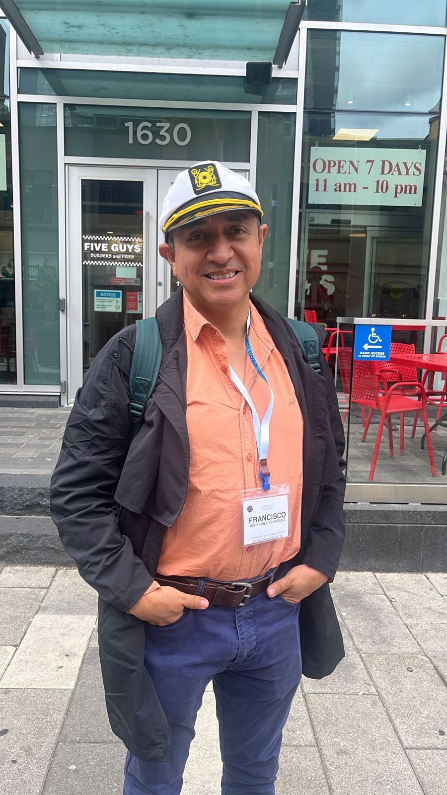 Francisco Rodríguez-Henríquez wearing a conference badge